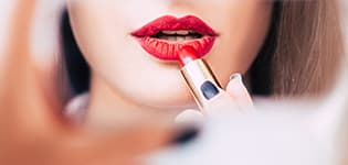 Woman with lipstick reflects PlusChem's expertise in Cosmetic Ingredients