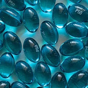 Blue pills iillustrates PlusChem's expertise in the Pharmaceutical industry